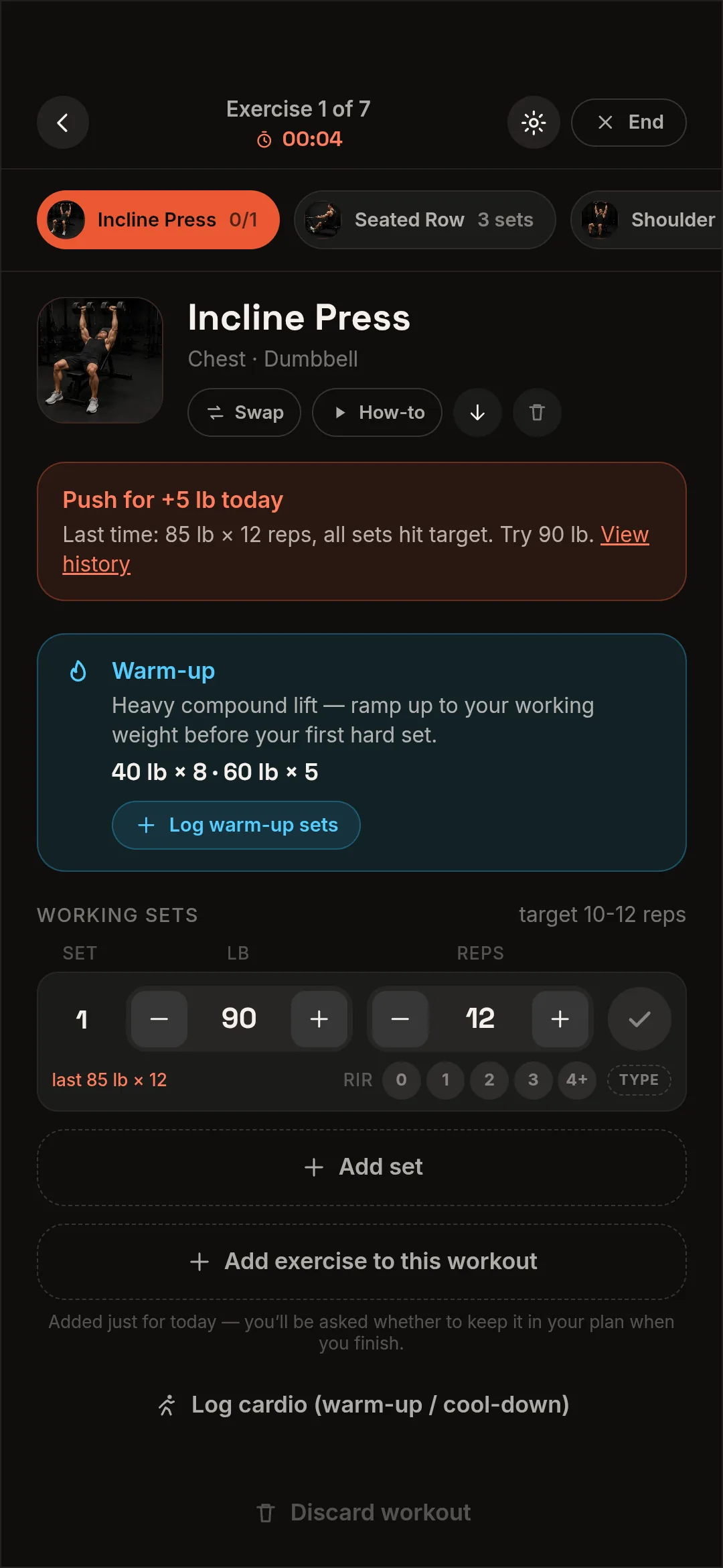 Logging a set in Alpha Lifts: the Incline Press screen, chest and dumbbell, exercise one of seven, with the app saying to push for five pounds more today because every set hit target last time at 85 lb for 12 reps, so try 90 lb.